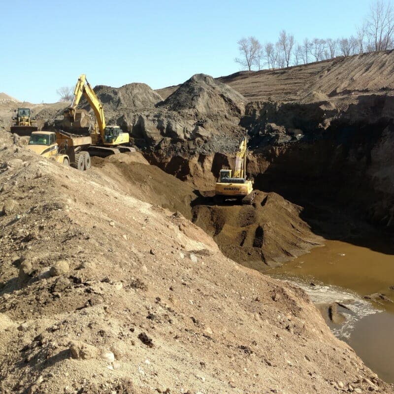 Excavator Digging Pit