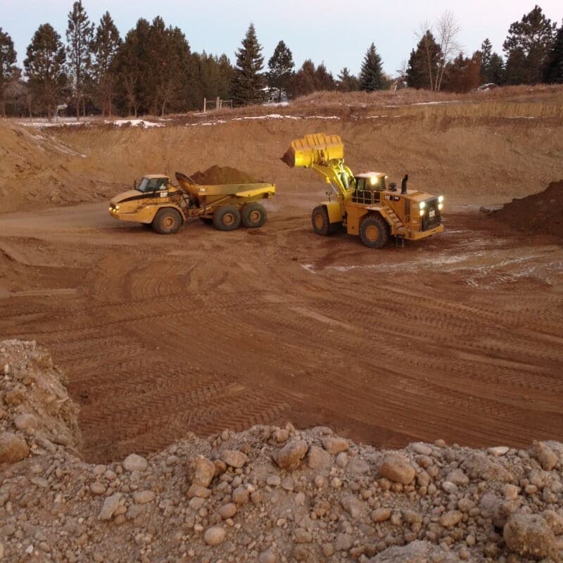 Placing Dirt in Dump Truck